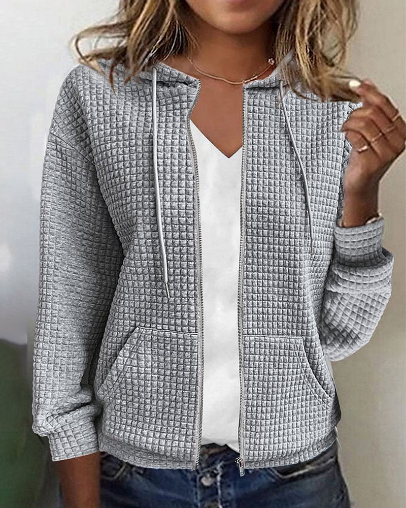 Women's textured zip-up hoodie jacket with front pockets. Cozy, comfortable outerwear for casual everyday wear.