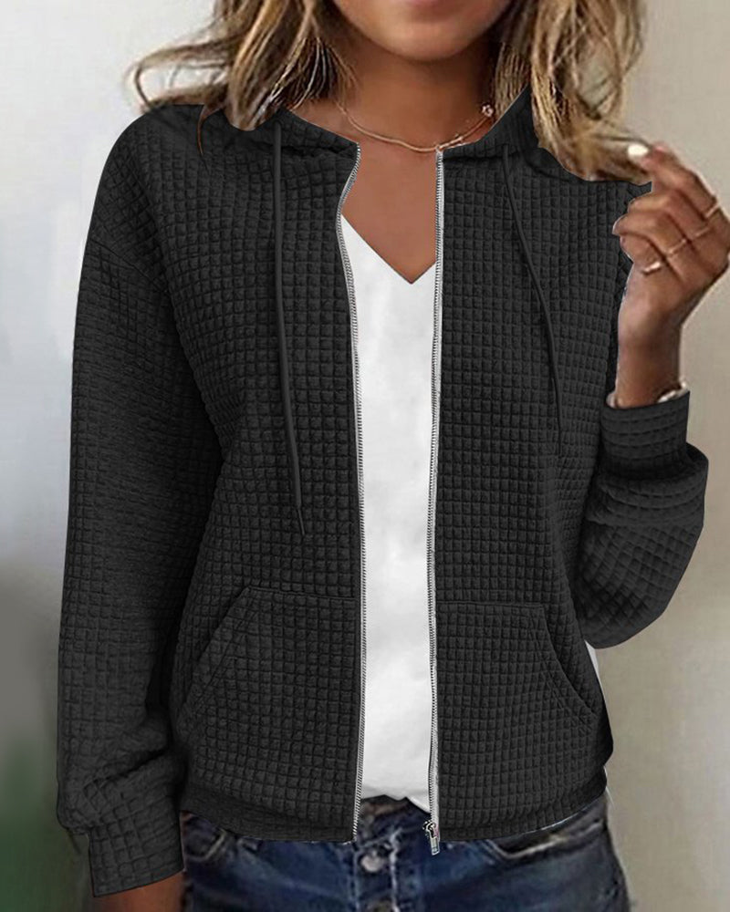 Soft, textured women's zip-up hoodie jacket. Ideal casual outerwear with a cozy hood & functional front pockets.