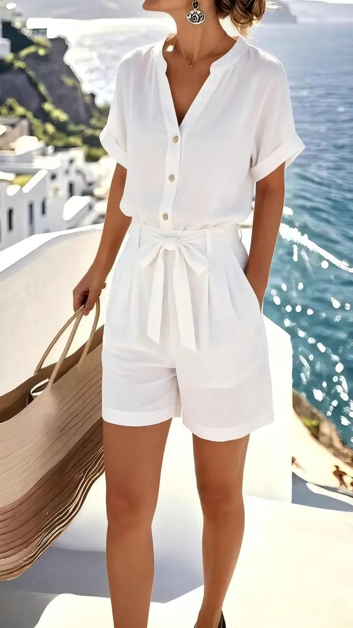Effortless women's playsuit with relaxed fit & tie-front detail. Ideal for beachwear & summer casual outfits.