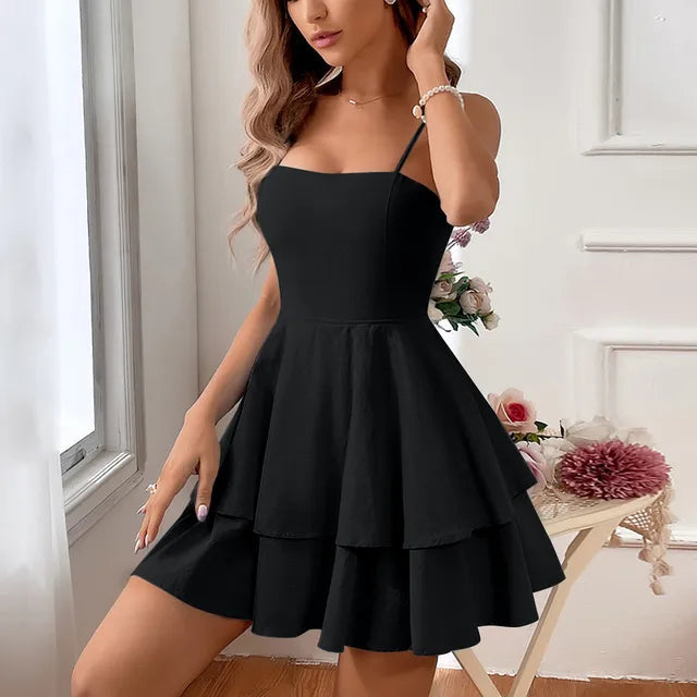 Women's tiered A-line mini homecoming dress with delicate spaghetti straps, perfect for dances & parties.