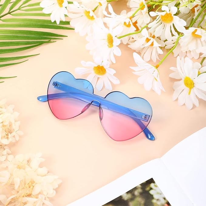 Eye-catching transparent heart-shaped rimless sunglasses for women. Trendy festival fashion.