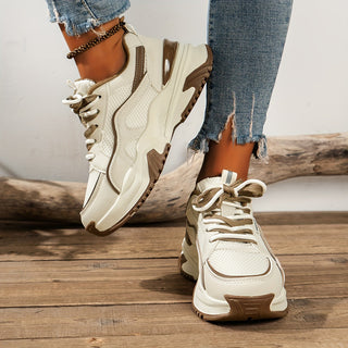 Comfortable women's platform sneakers with a modern thick sole, ideal for trendy casual footwear.