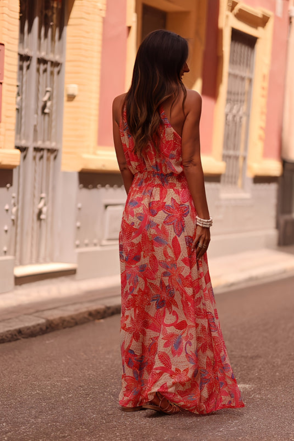 Women's tropical print maxi dress, elegant halter design with keyhole. Perfect for resort wear & summer outings.