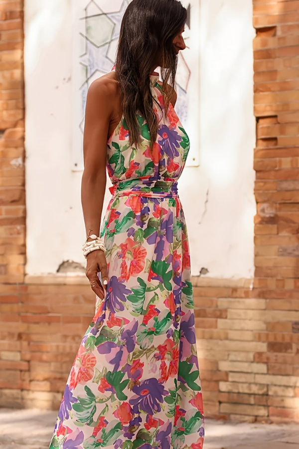 Women's tropical halter maxi dress with keyhole, styled for a chic summer beach vacation & resort look.