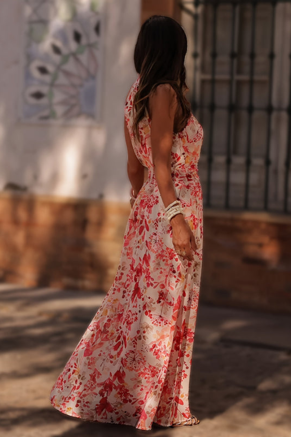 Lightweight women's tropical print maxi dress. Elegant halter neck keyhole design, vacation & beach ready.