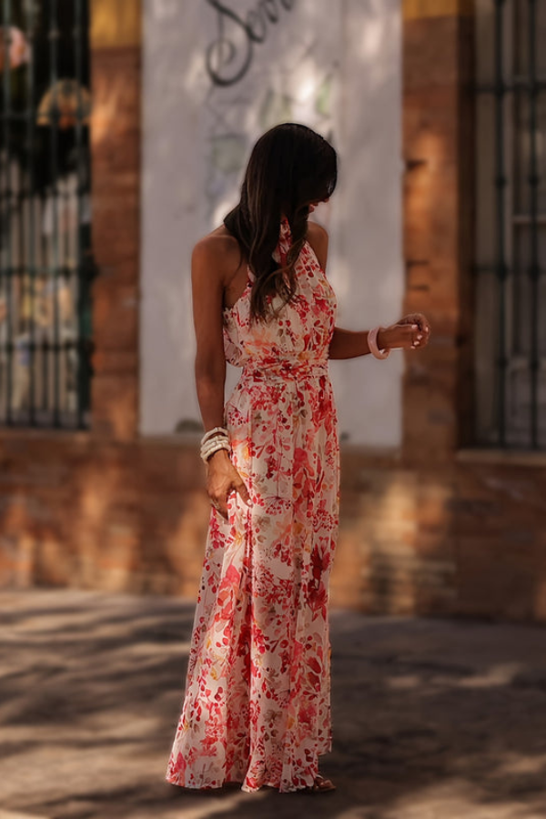 Bright tropical floral print halter keyhole maxi dress for women. Vibrant summer resort dress, perfect for holidays.