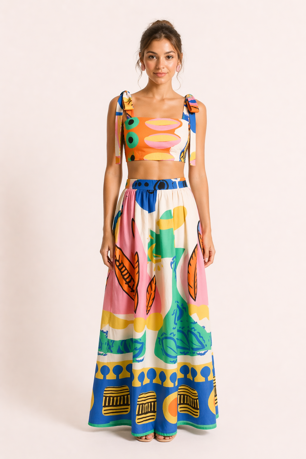 Sleeveless tropical print crop top & flowing maxi skirt set. Ideal for women's summer beach vacations.