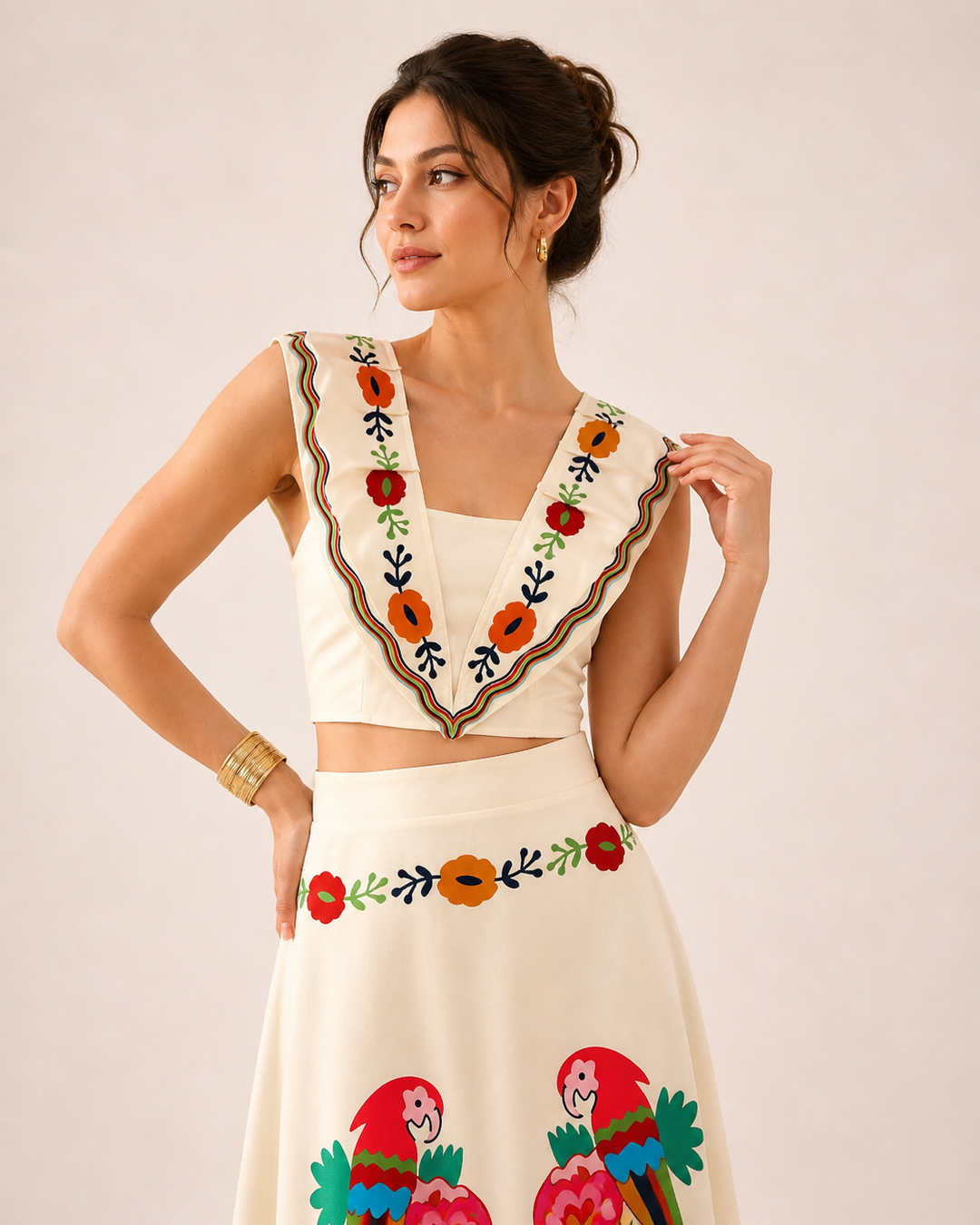 Fashionable women's tropical crop top & flowy maxi skirt set, ideal vacation wear.