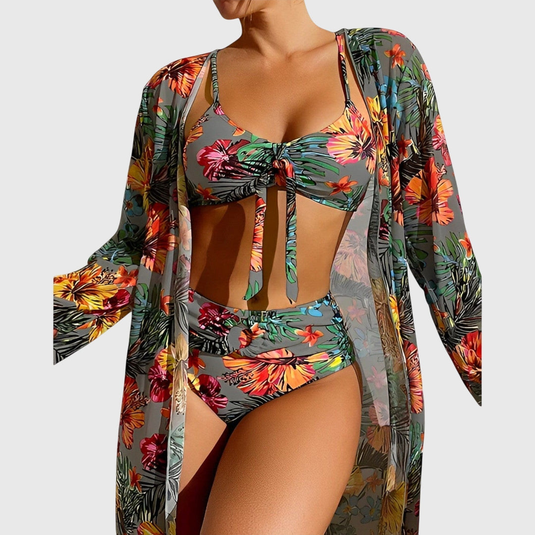 Close-up of vibrant tropical floral print on a women's flattering two-piece bikini for resort wear.