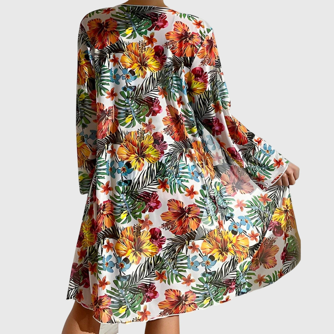 Stylish women's tropical print two-piece swimsuit, perfect for a chic vacation look & poolside style.