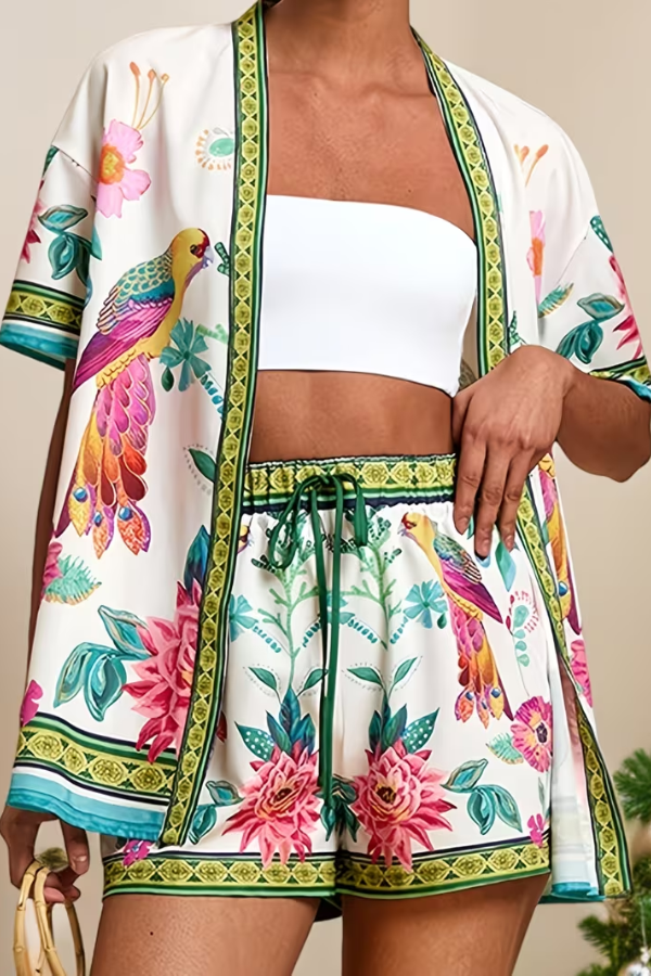 Women's tropical print two-piece summer set with shorts. Ideal for beach, vacation, or casual resort wear.
