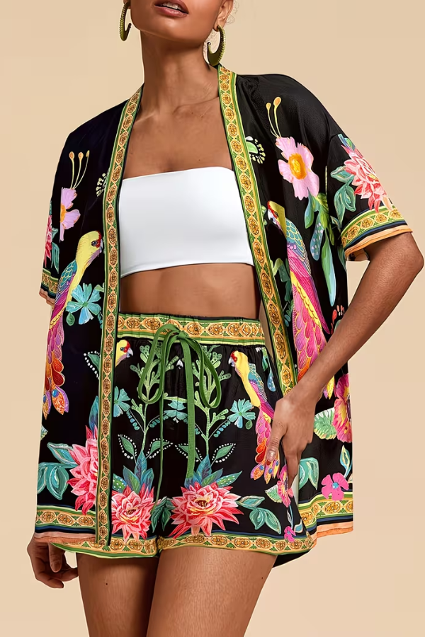 Women's tropical print crop top & shorts two-piece set. Vibrant summer vacation and resort wear.