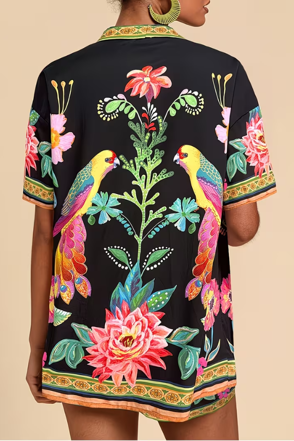 Vibrant women's tropical print summer two-piece shorts set. Perfect for sunny vacations and resort wear.
