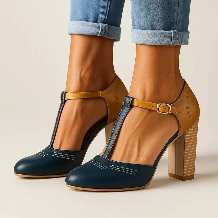 Close-up of comfortable women's two-tone block heel pumps, highlighting the stable block heel design.
