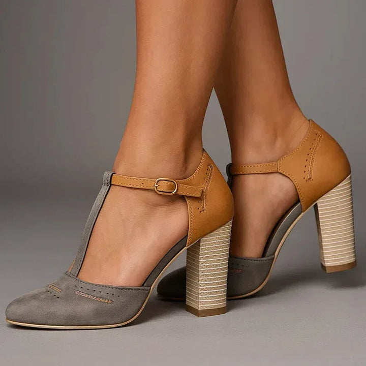 Fashionable women's two-tone block heel pumps in blue, offering elegant style for daily & office wear.