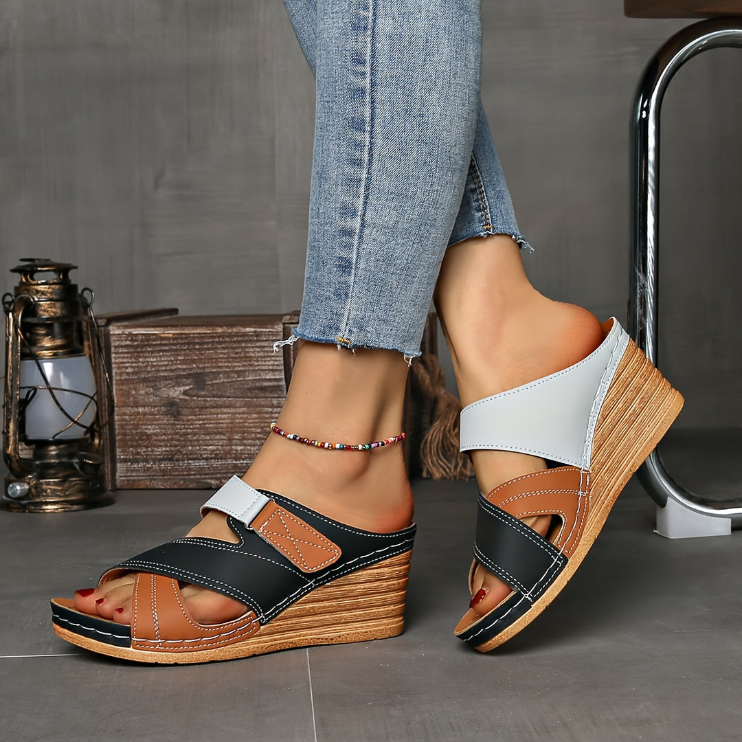 Women's two-tone open-toe wedge slides, a must-have for summer fashion.