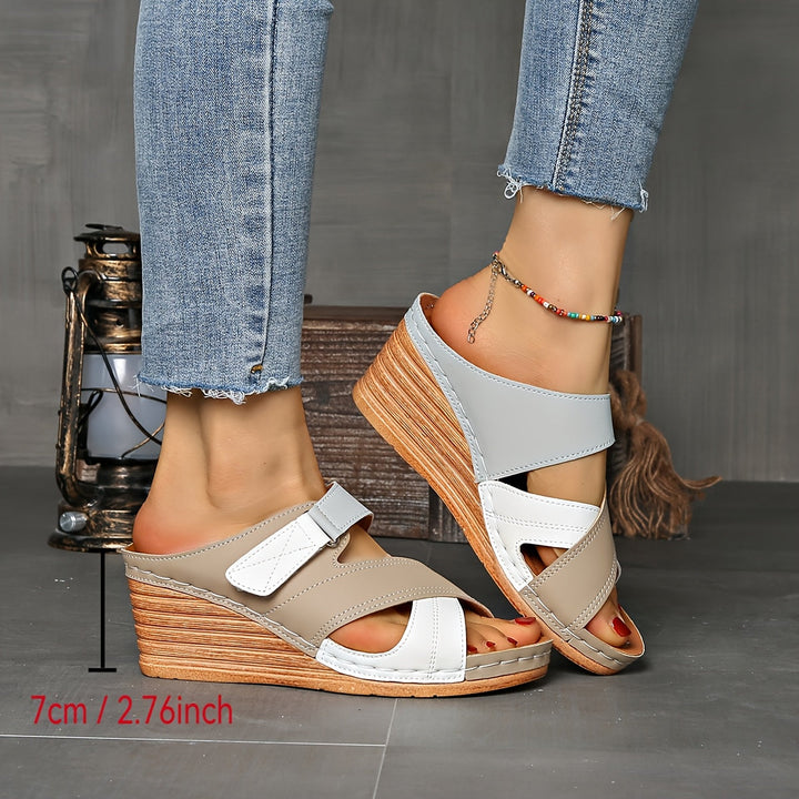 Durable two-tone wedge women's slides, perfect beach & poolside footwear.