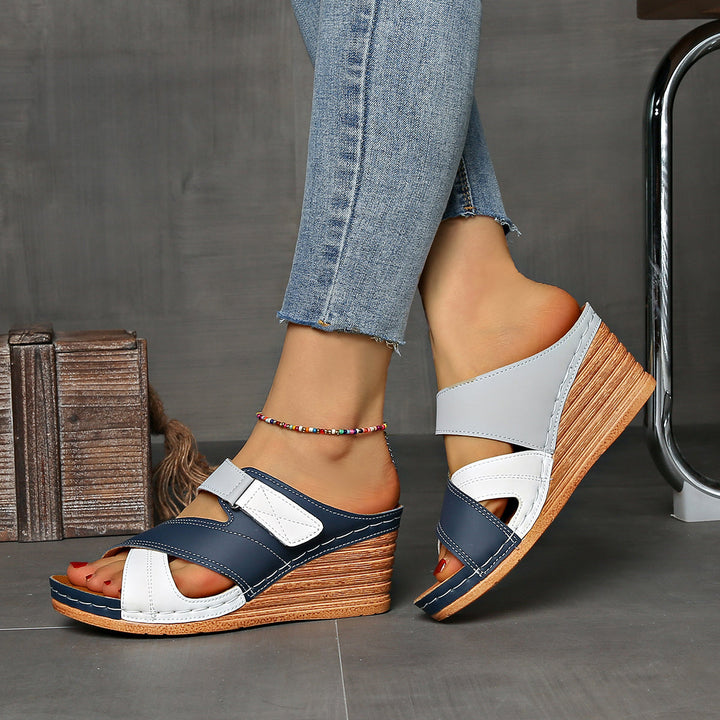 Versatile women's two-tone wedge slides, perfect for warm weather.