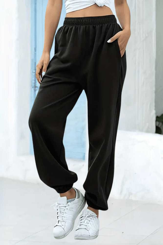 Women's comfy high-rise joggers, elastic waist, great for casual wear or light activity.