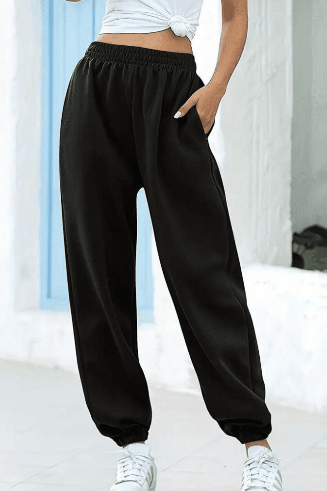 Flattering women's high-rise joggers with elastic waist, offering a relaxed and comfortable fit.