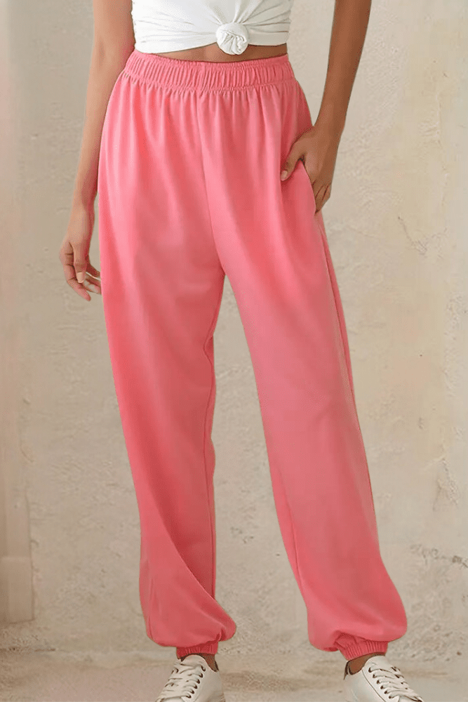 Women's high-rise joggers featuring a comfortable elastic waist, ideal for lounge and activewear.