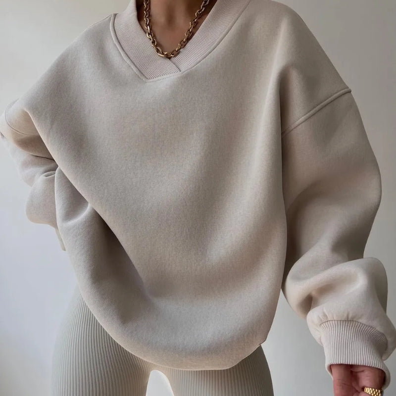 Women's ultra-soft oversized pullover top in a comfortable black cotton blend, perfect for casual everyday wear.