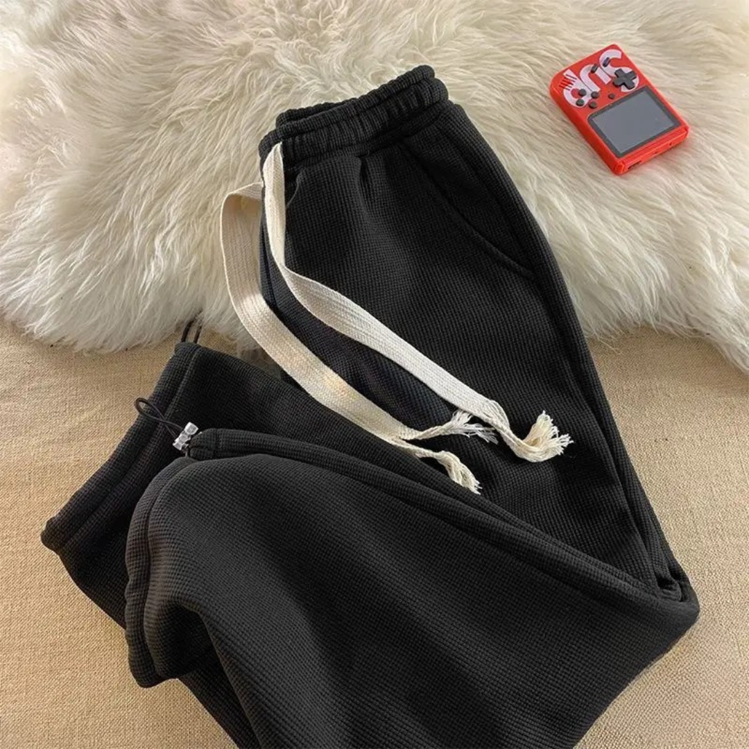 Ultra-soft women's lounge pants for ultimate warmth & cozy wear. Perfect everyday casual apparel with elastic waist.