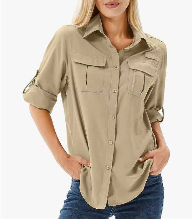 Women's long sleeve safari shirt with UV protection, quick-dry fabric, and roll-up tabs for adventure.
