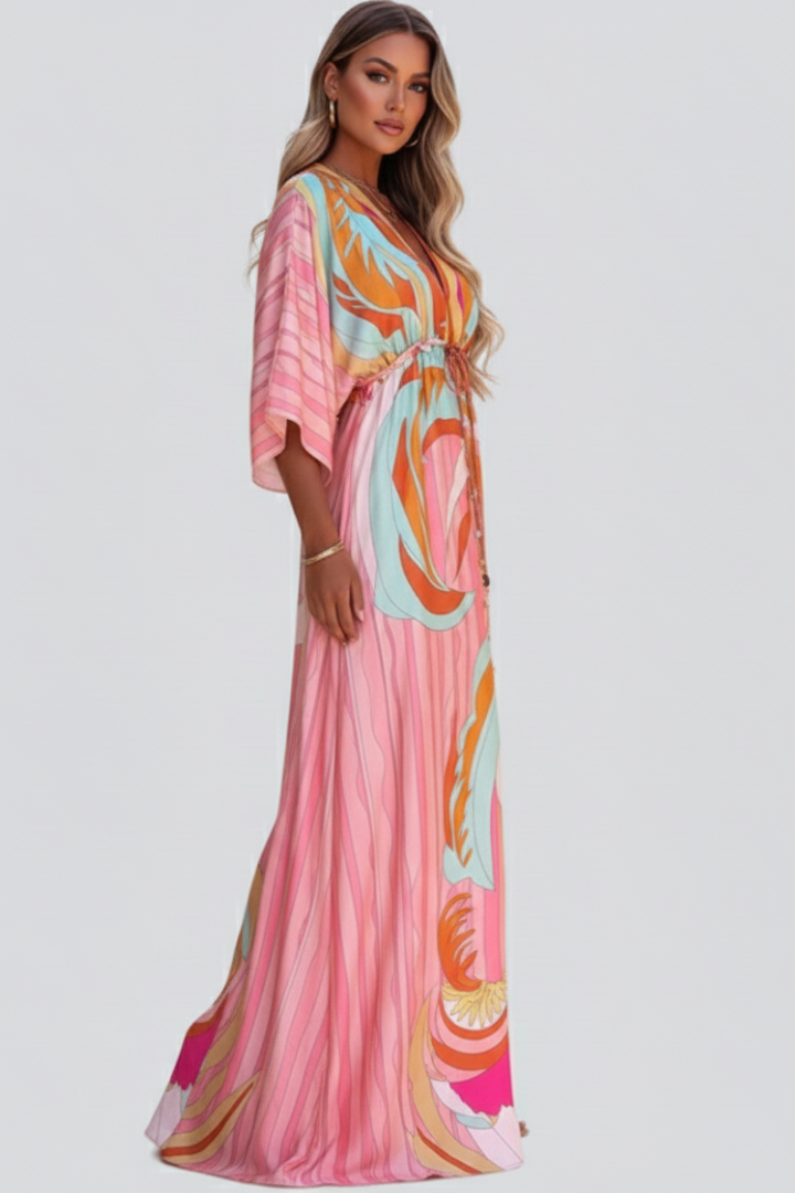 Elegant women's V-neck maxi dress with an abstract print and belt, ideal for casual or dressy spring and summer events.