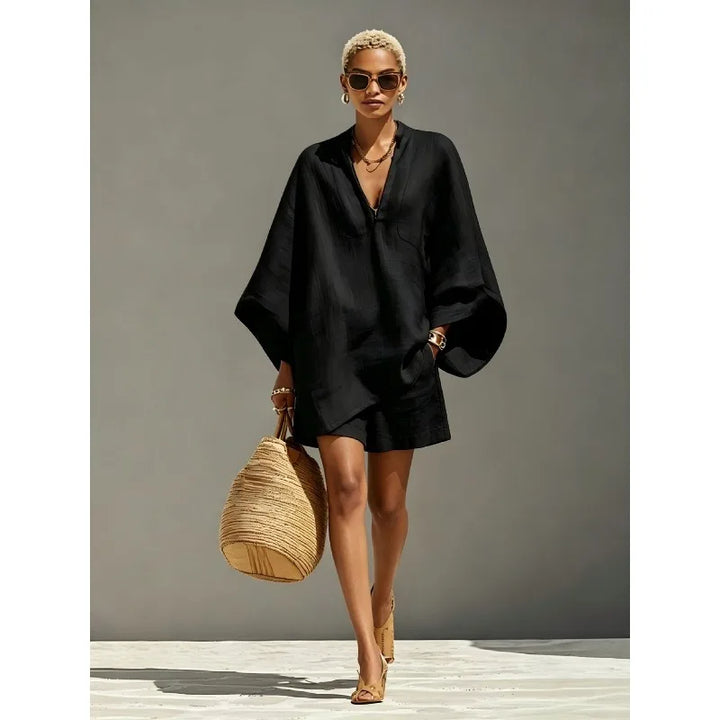 Relaxed fit women's two-piece V-neck batwing top and shorts set, perfect for lounge wear or a beach outfit.