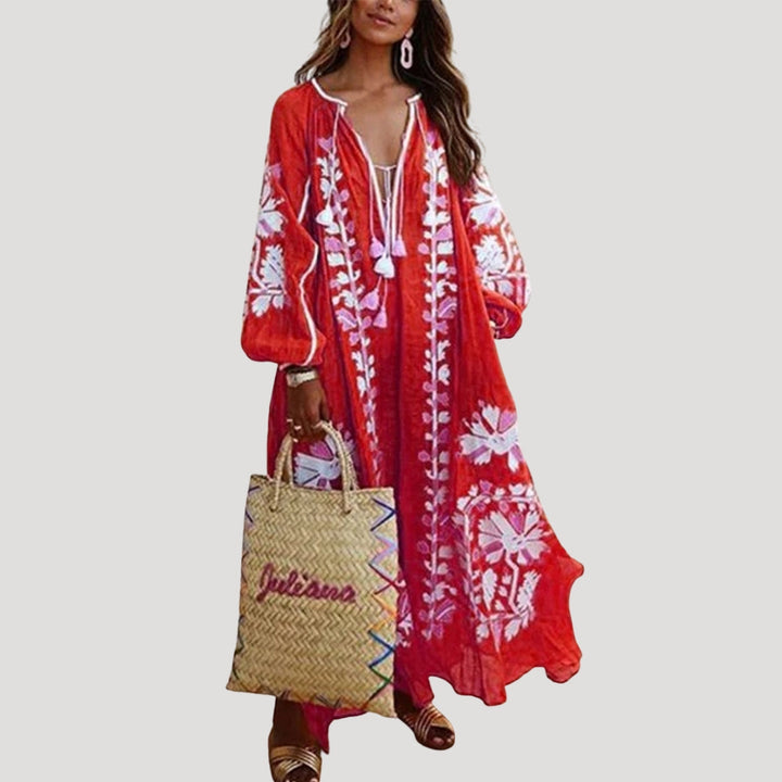 Women's V-Neck Boho Maxi Dress with flowing long sleeves, perfect for casual wear or holiday style. Elegant & comfortable.