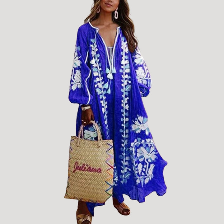 Comfortable women's flowing Boho maxi dress with V-neck and long sleeves. Loose fit, ideal for summer casual or beach holidays.