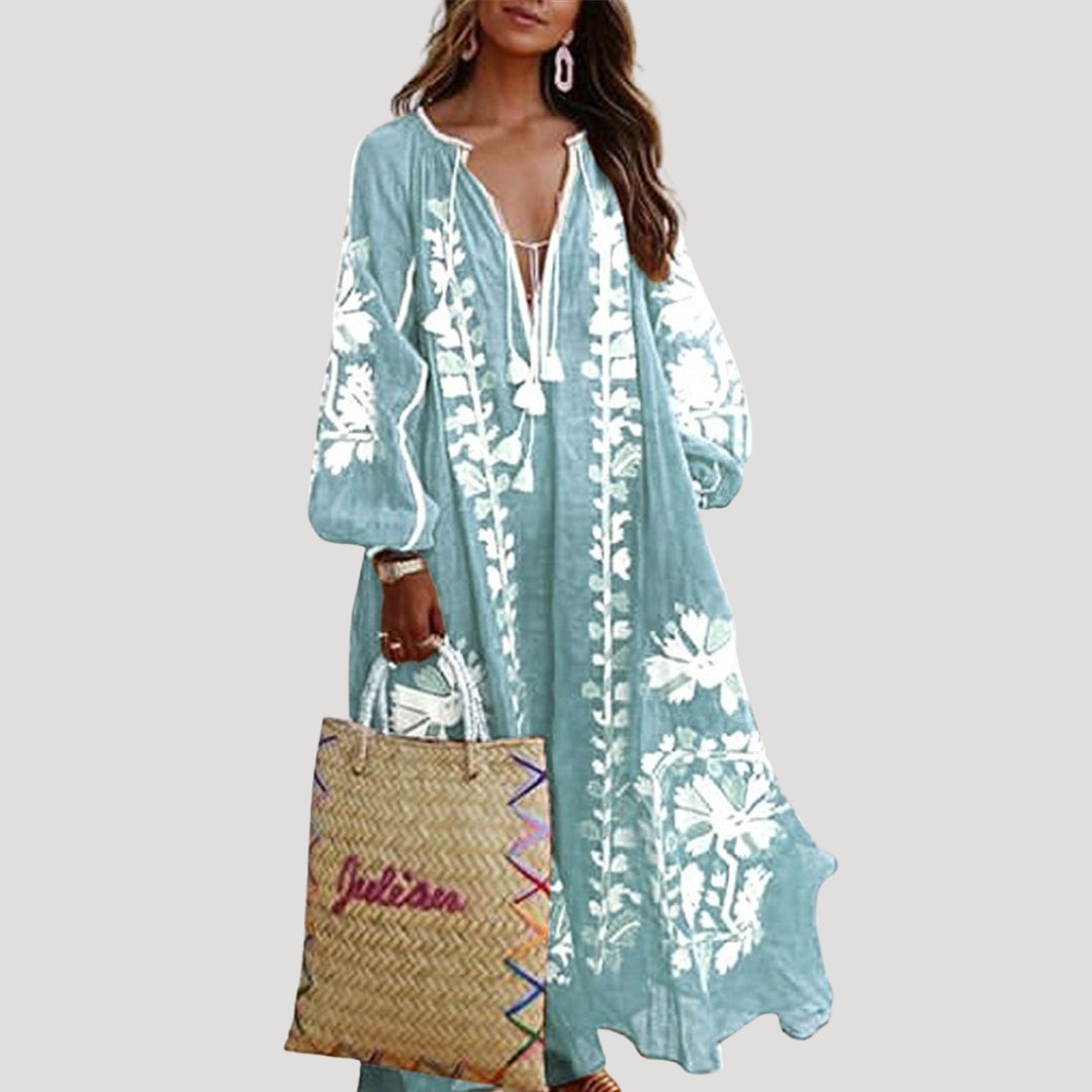 Elegant patterned V-neck Boho maxi dress for women. Features long flowing sleeves and a comfortable loose fit, perfect for summer.