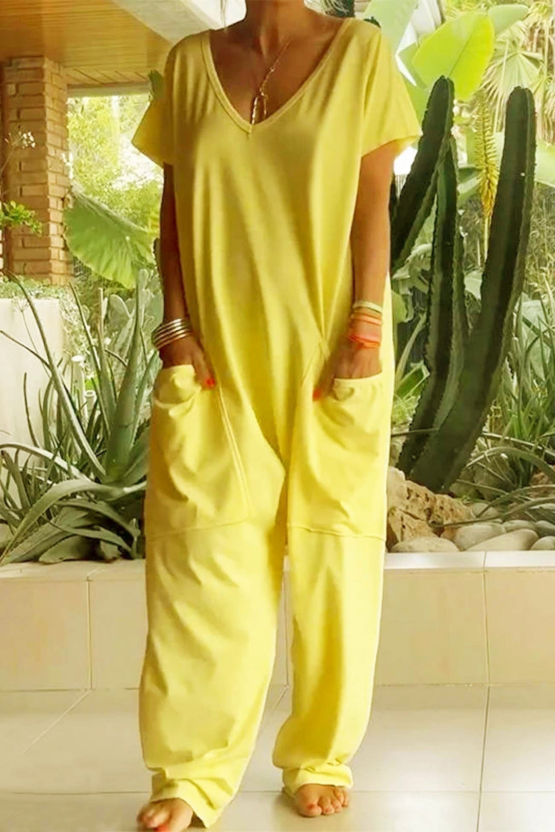 Comfortable women's casual V-neck jumpsuit. Perfect travel wear or loungewear for spring & summer.