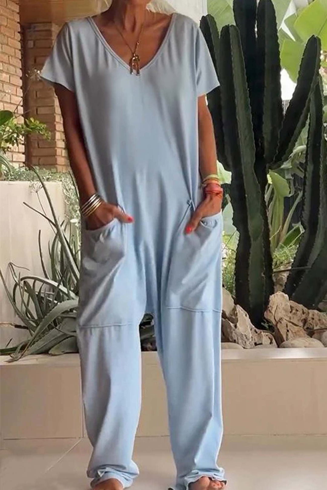 Chic women's V-neck short sleeve jumpsuit. Ideal casual fashion for warm spring & summer days.