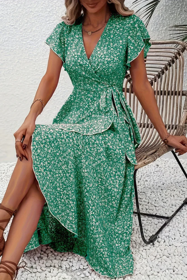 Elegant V-neck floral dress for women, flattering silhouette, ideal for chic summer wear.
