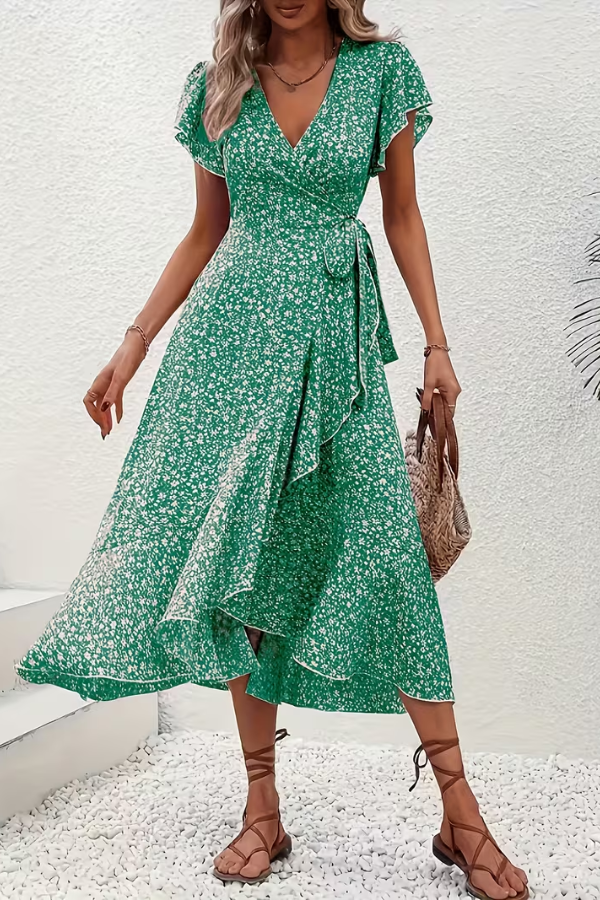 Sophisticated women's V-neck floral dress, midi length, perfect for special occasions.