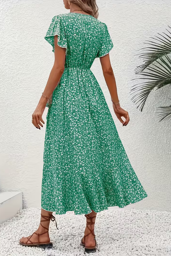 Women's V-neck floral elegance dress, flattering fitted silhouette, chic summer fashion.