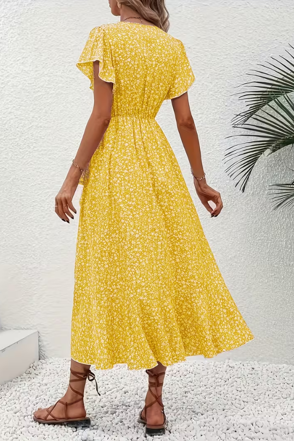 Women's floral V-neck midi dress with a unique asymmetrical hem, elegant & modern.