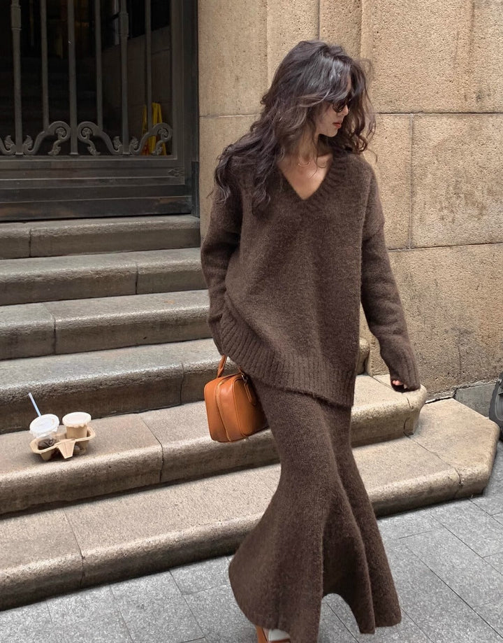 Women's V-neck knit sweater and midi skirt set, a comfortable and versatile two-piece matching outfit.