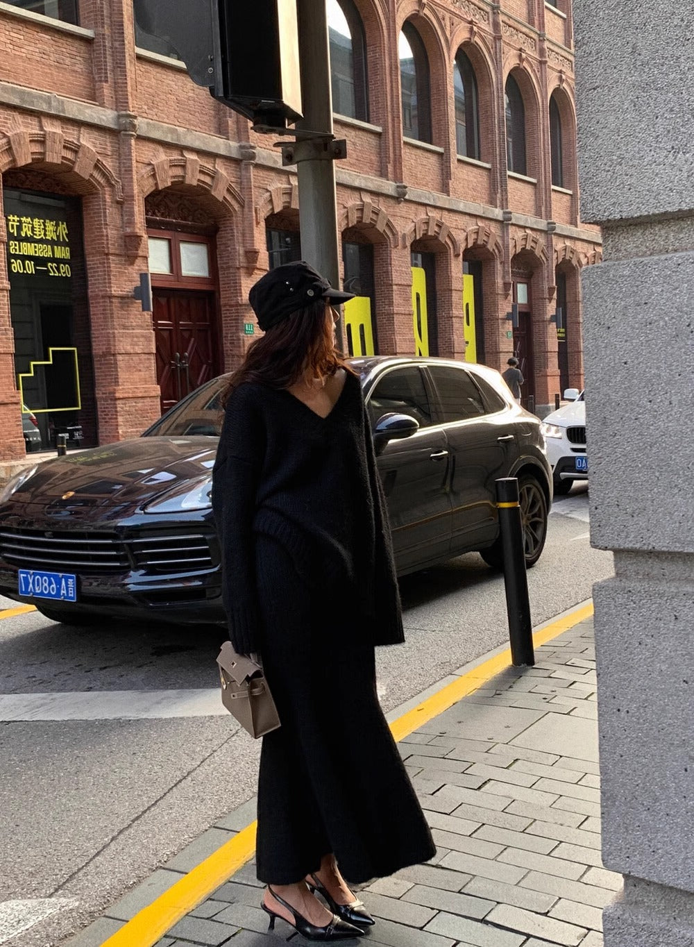Versatile women's V-neck knit long sleeve sweater and midi skirt set, an elegant two-piece clothing set.