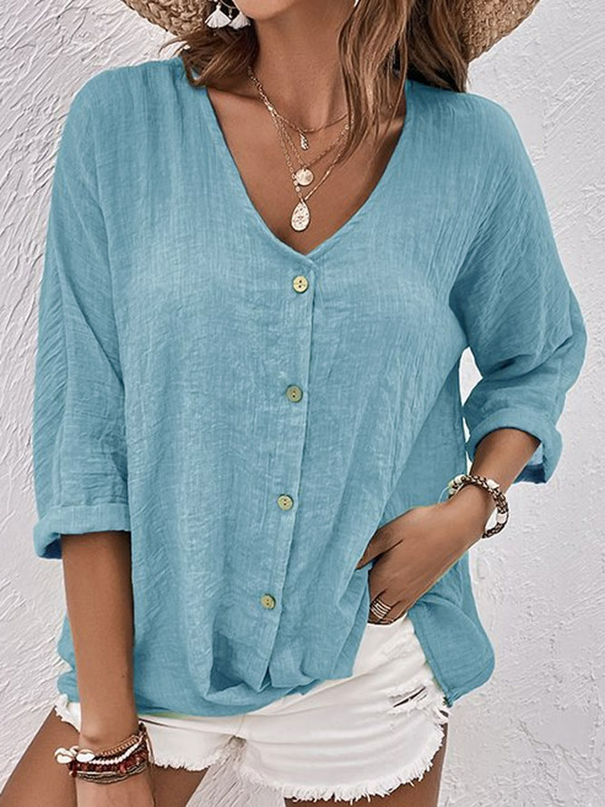 Women's V-neck long sleeve button-down shirt, perfect for casual daily wear. Comfortable & versatile blouse.