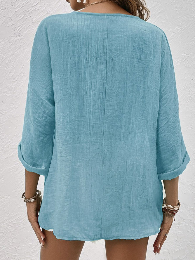 Comfortable women's relaxed fit V-neck long sleeve button-down shirt, ideal for spring & summer casual outfits.