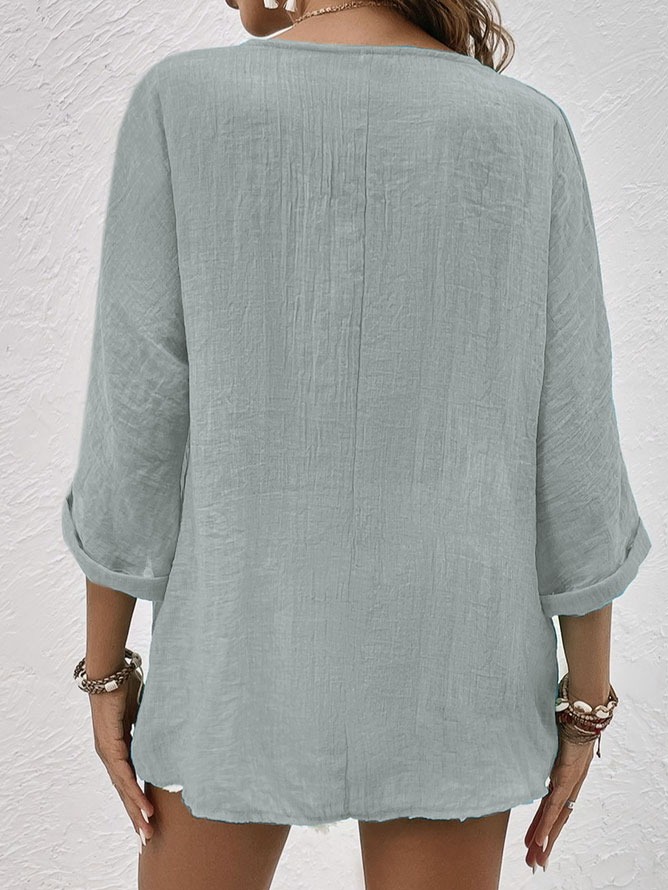 Stylish women's V-neck long sleeve button-down blouse, a versatile top for daily wear & casual occasions.