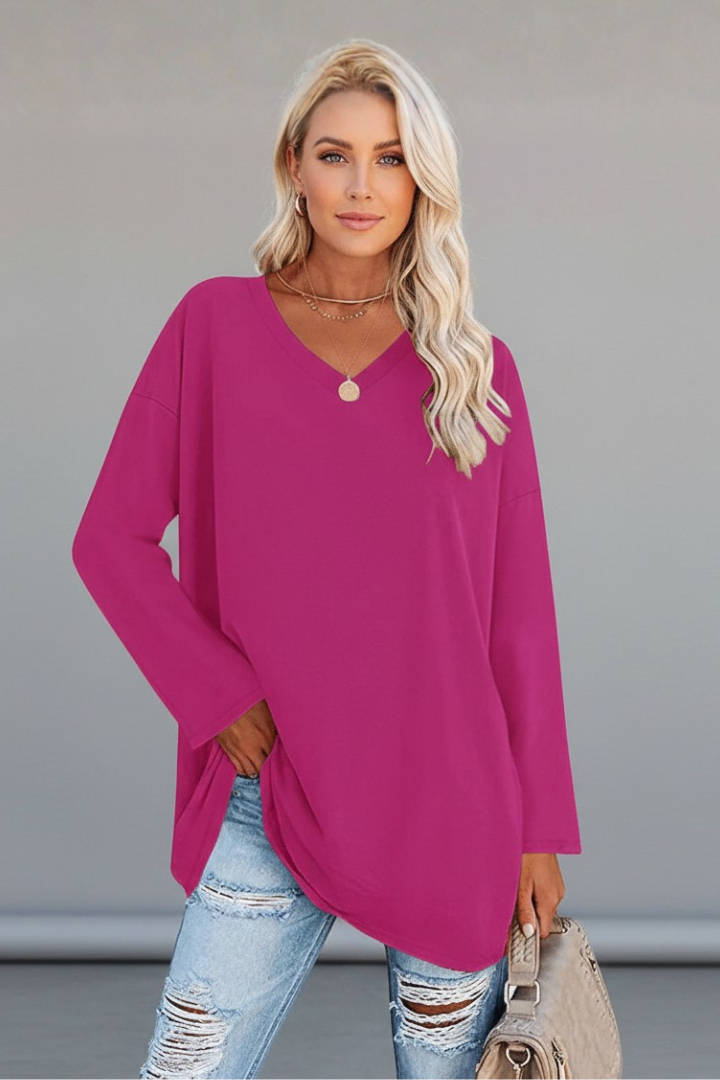 Comfortable & stylish women's V-neck long sleeve top, relaxed fit for versatile everyday apparel.