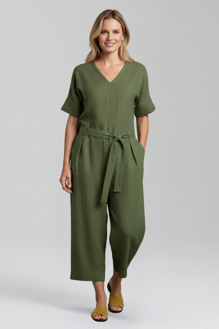 Women's elegant V-neck long sleeve wide leg jumpsuit. Comfortable, versatile one-piece for modern women's fashion.
