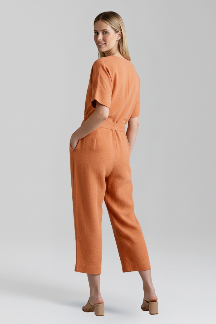 Soft fabric women's V-neck wide leg jumpsuit with long sleeves; a comfortable and chic one-piece outfit.