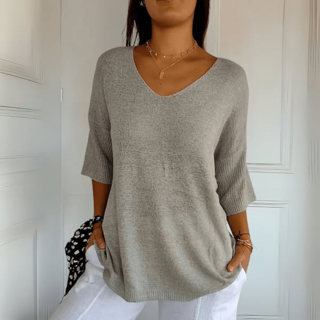 Stylish women's loose V-neck sweater, a casual knit essential for effortless everyday fashion.