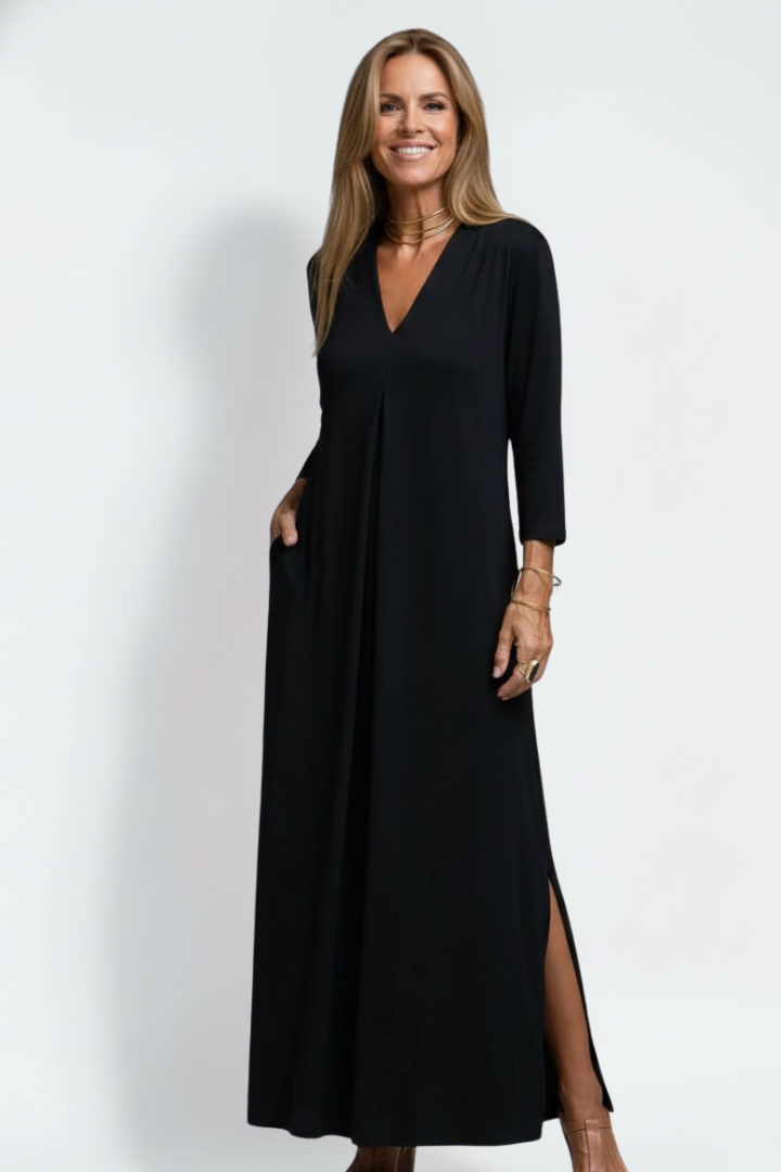 Vacation-ready women's V-neck maxi dress, sleeveless with a stylish side slit, very comfortable.
