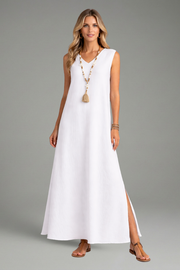 Comfortable sleeveless V-neck maxi dress with a flattering side slit for a stylish summer look.
